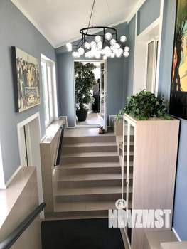 Коттедж 339м², 3-этажный, участок 12 сот.