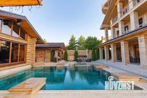 Коттедж 1737м², 4-этажный, участок 15 сот.