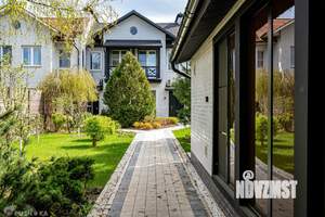 Таунхаус 254м², 2-этажный, участок 6 сот.