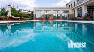 Коттедж 1663м², 3-этажный, участок 25 сот.  