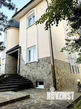 Коттедж 445м², 3-этажный, участок 12 сот.  
