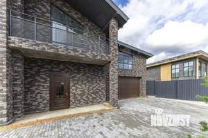 Коттедж 240м², 2-этажный, участок 5 сот.  