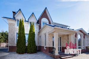 Коттедж 450м², 3-этажный, участок 15 сот.  