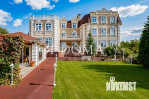 Дом 1650м², 2-этажный, участок 45 сот.  