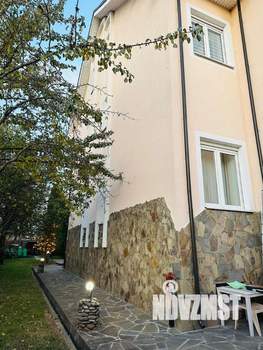 Коттедж 445м², 3-этажный, участок 12 сот.  