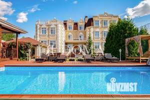 Дом 1650м², 2-этажный, участок 45 сот.  