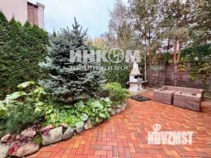 Таунхаус 303м², 4-этажный, участок 5 сот.  